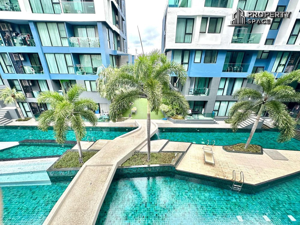 Near Beach! 1-Bedroom Corner Unit Pool View at Acqua Jomtien Pattaya For Rent Image 1